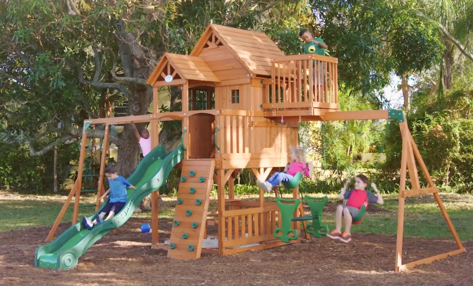 garden playhouse with slide and swing